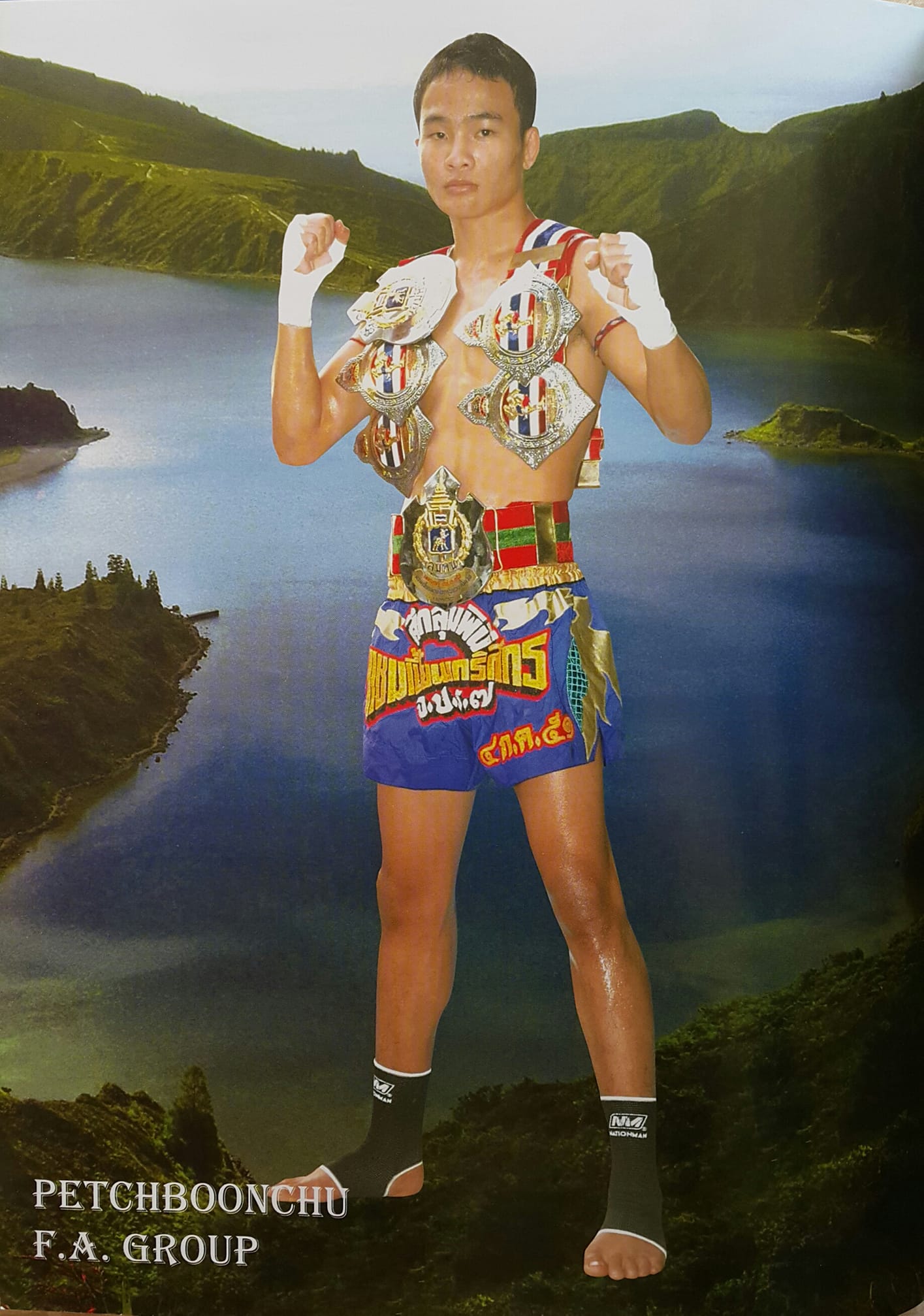 A photo of Petchboonchu FA Group with Muay Thai belts
